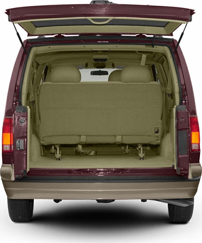 Rear interior with beige seats and open tailgate of a red minivan