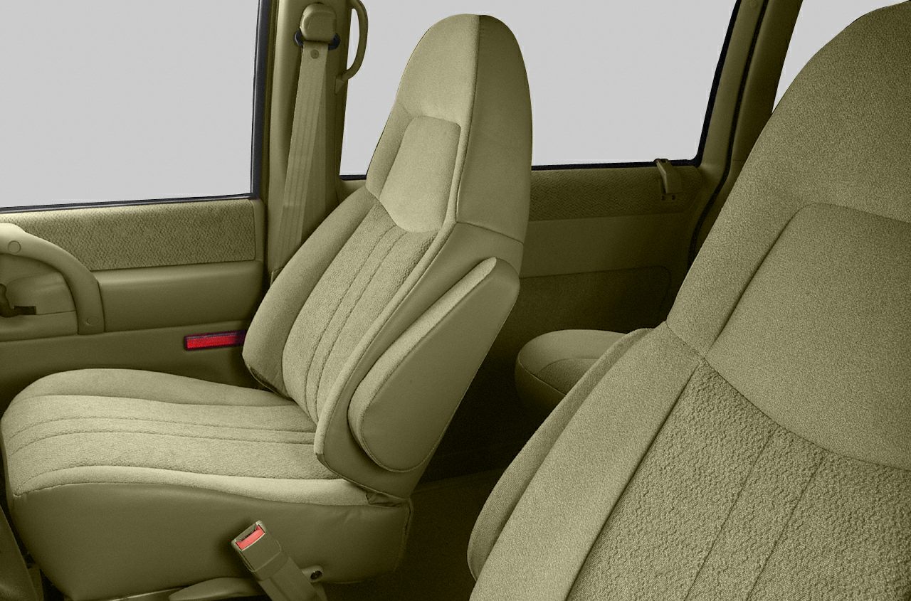 Cloth upholstered ergonomic front seats in vehicle interior