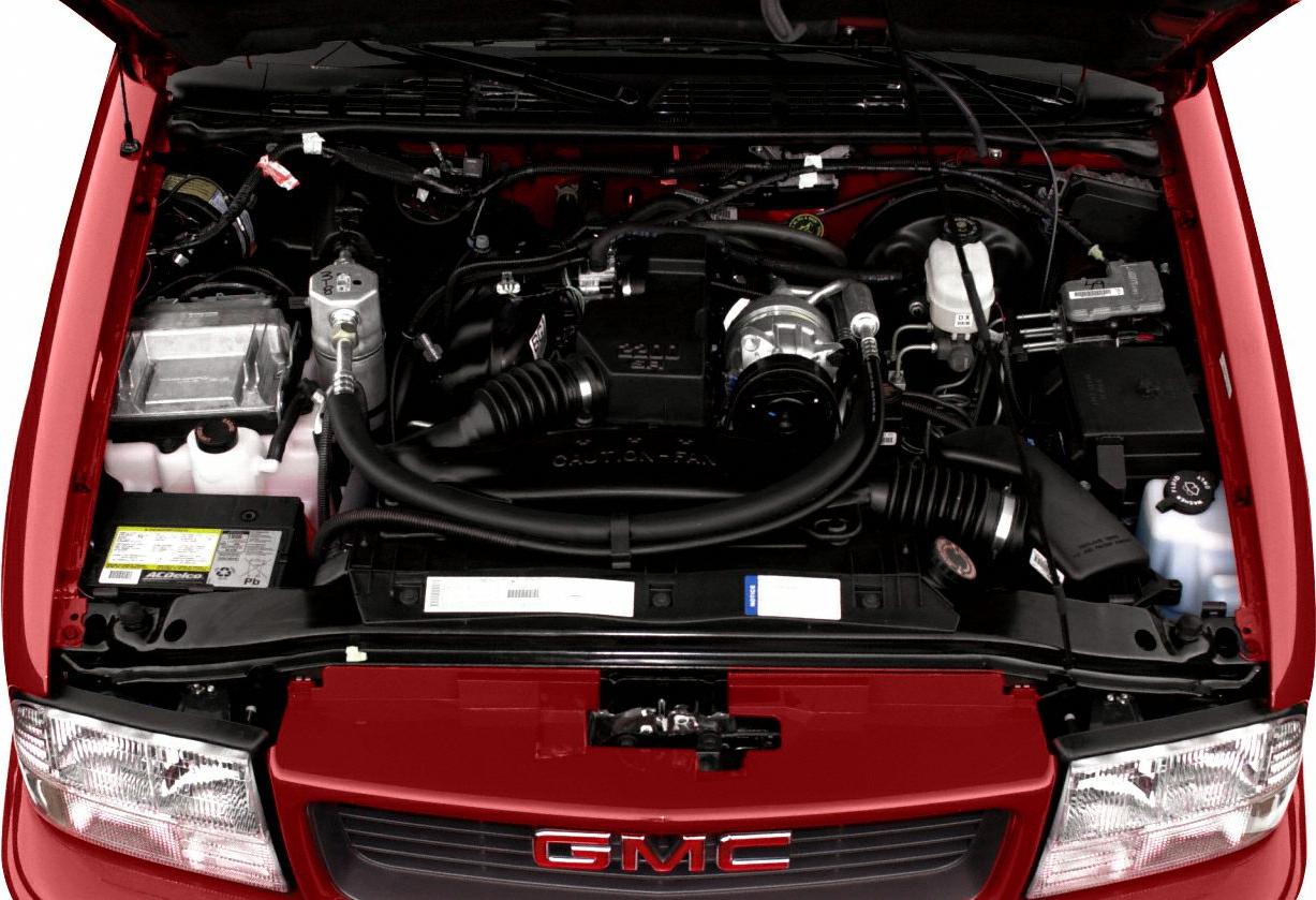 Engine bay with visible components and open hood