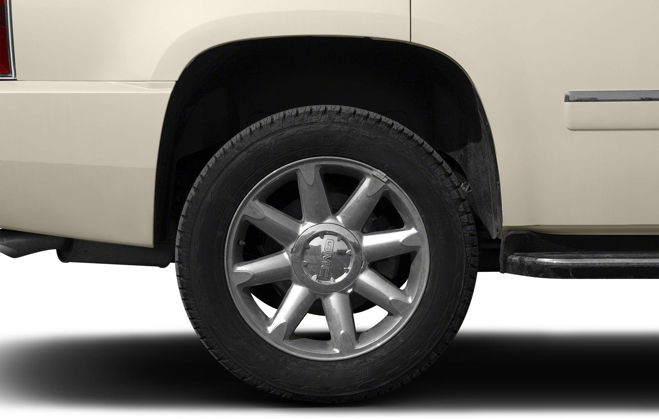 Close-up of alloy wheel and Bridgestone tire on SUV