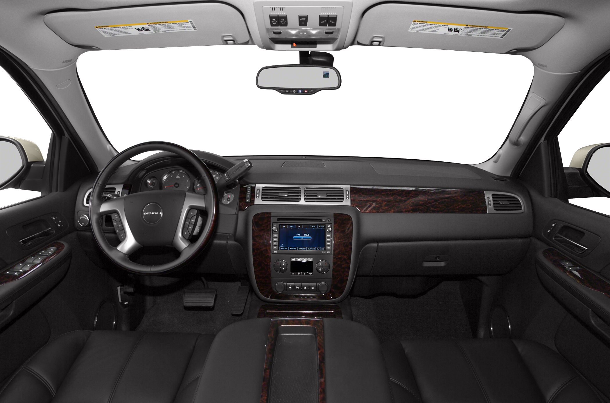 Luxury SUV interior with wood trim and digital display