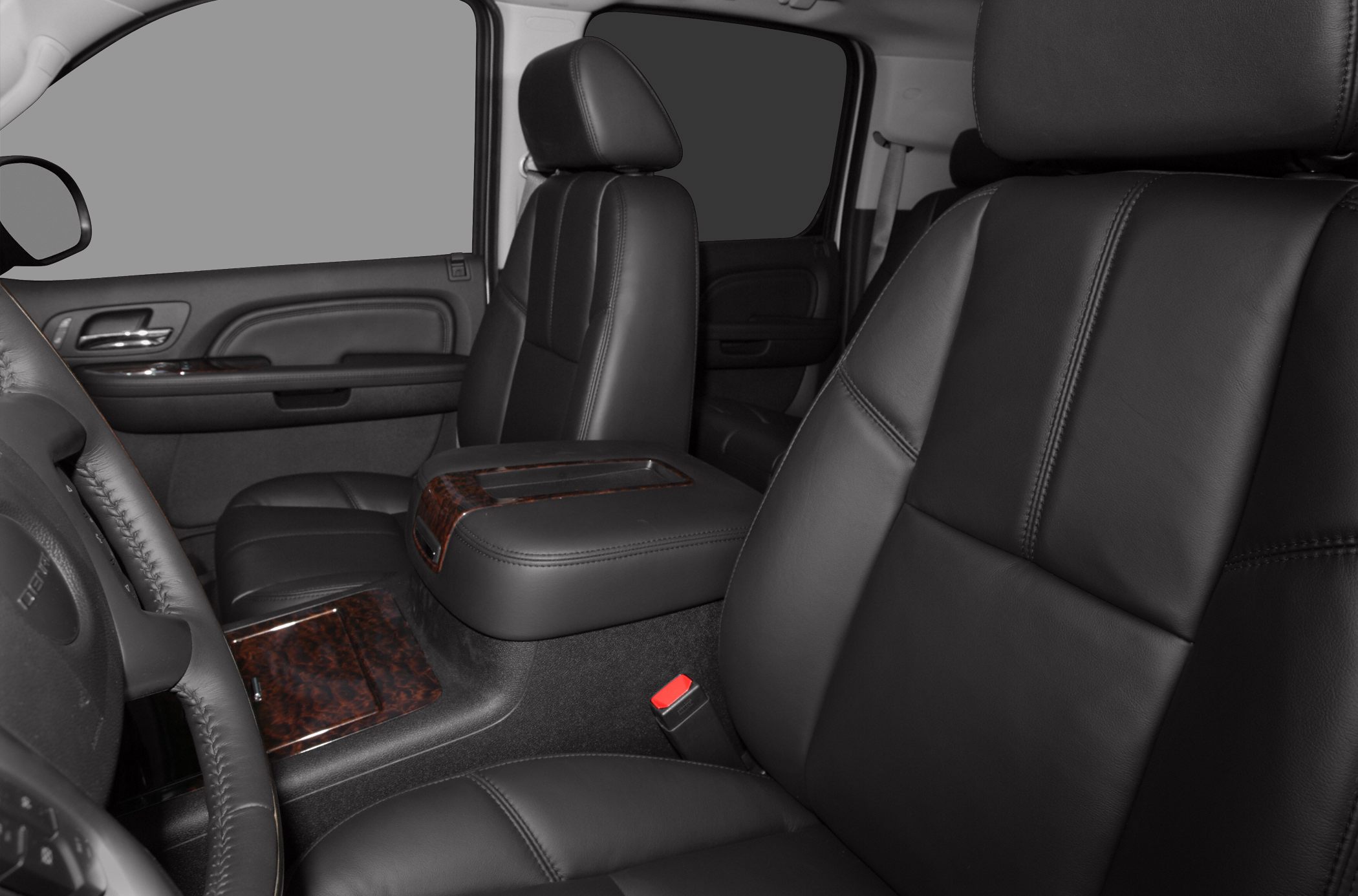 Black leather front seats with wood trim accents