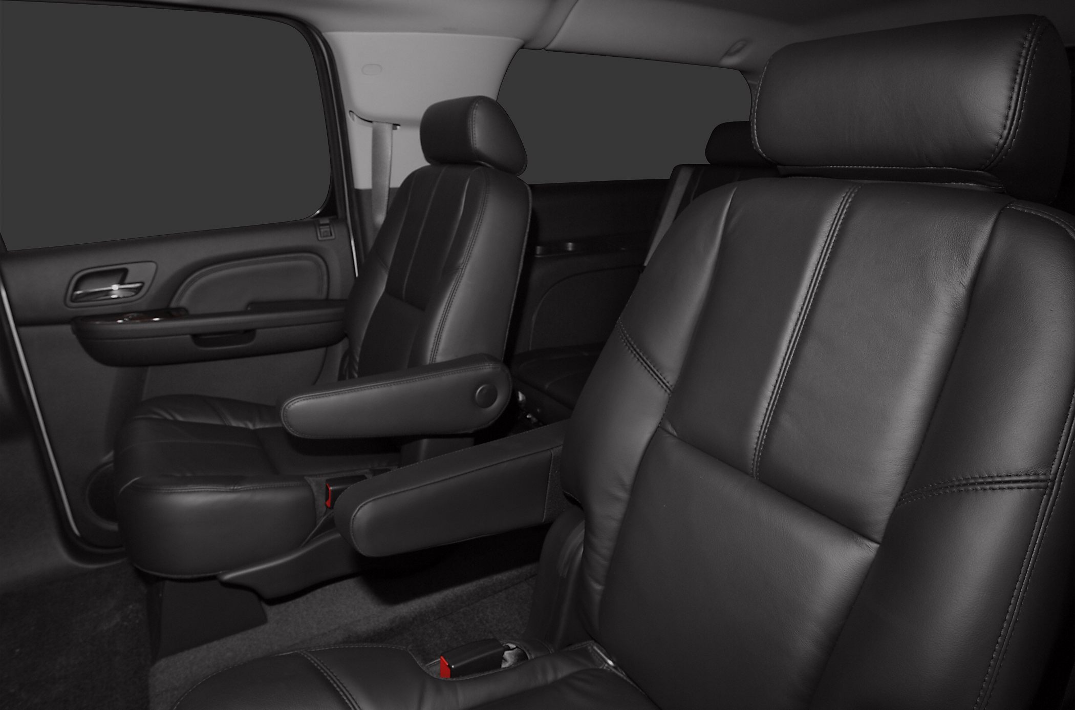 Black leather captain seats interior with armrests