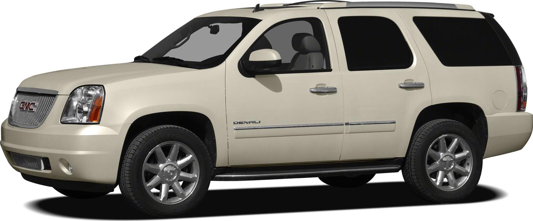 Side profile of a full-size SUV with Denali trim and alloy wheels