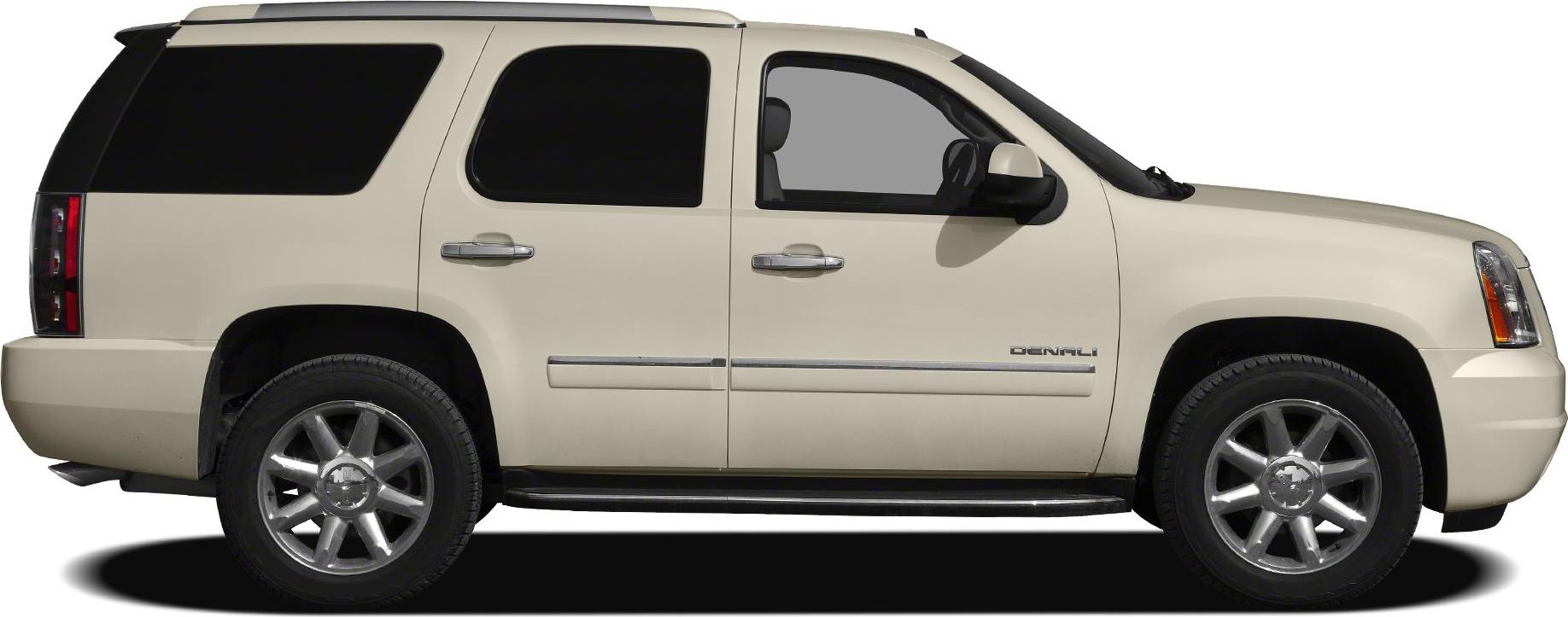 Side profile of full-size SUV with alloy wheels and dark tinted windows