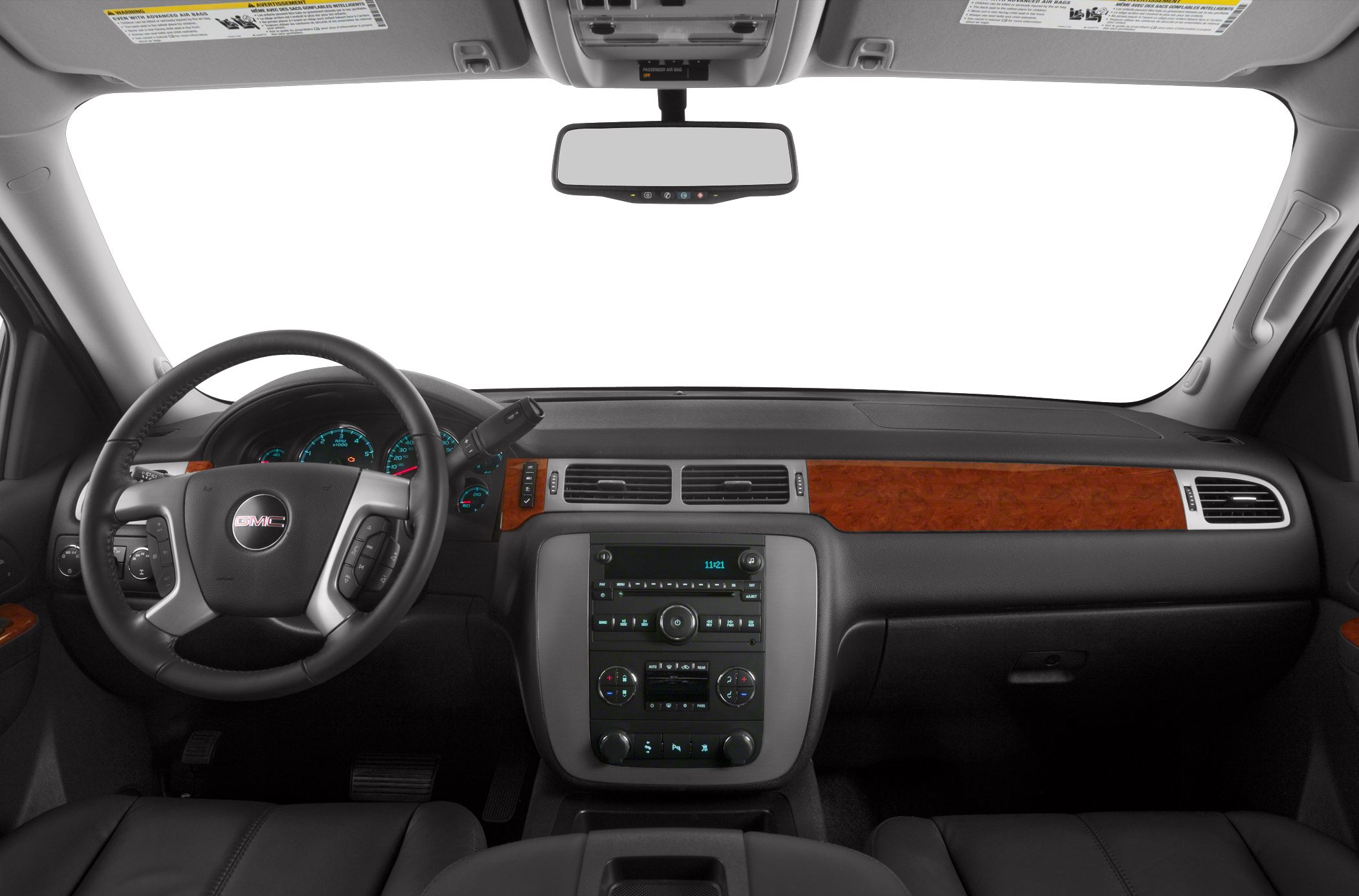 SUV interior with wood trim and multi-function steering wheel