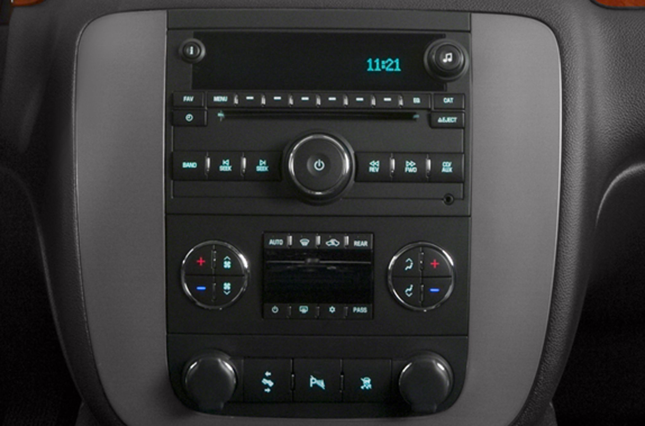 Audio and climate control panel with digital display and button layout