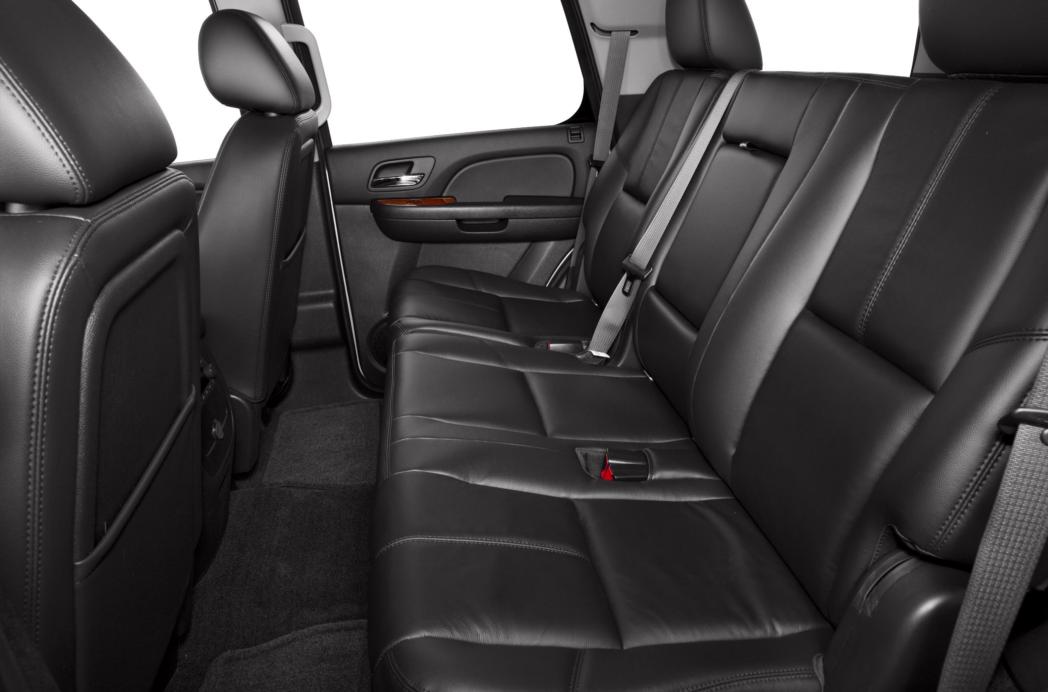 Black leather rear seats with seatbelts and door panel