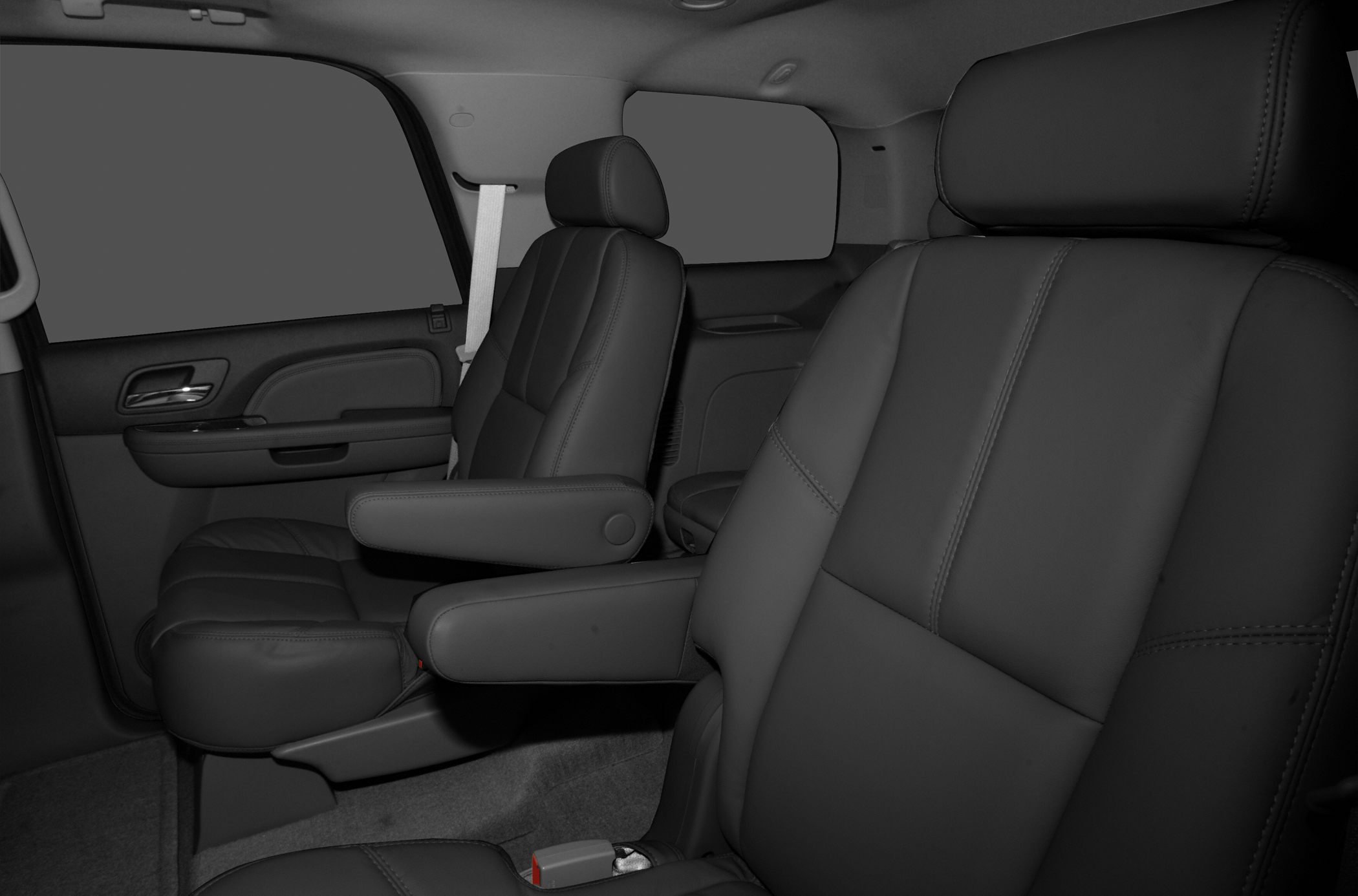 Leather interior seats with armrests and spacious cabin layout