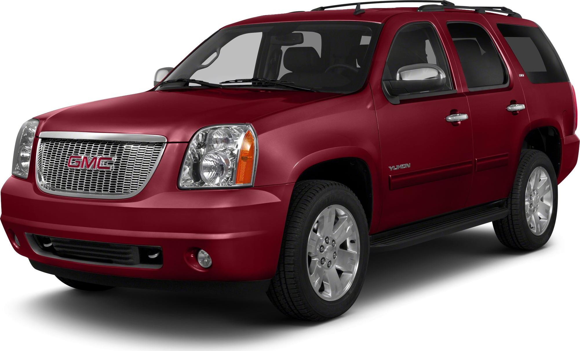 Red SUV with chrome grille and alloy wheels in front three-quarter view