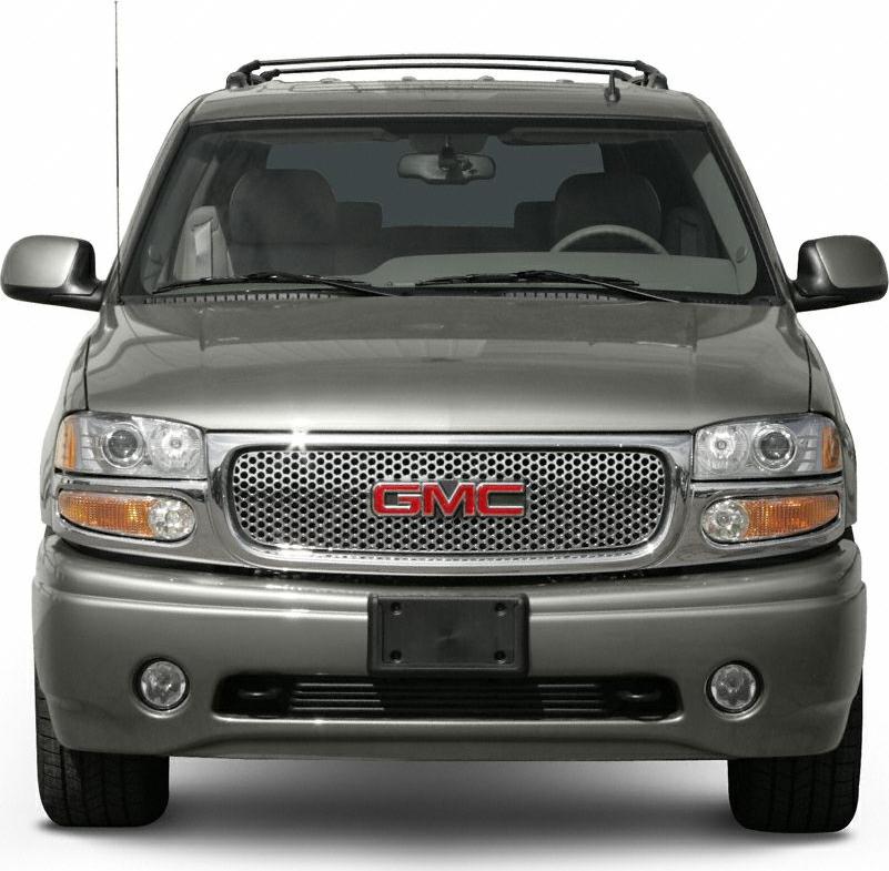 Chrome mesh grille and rounded headlights with amber indicators and fog lamps