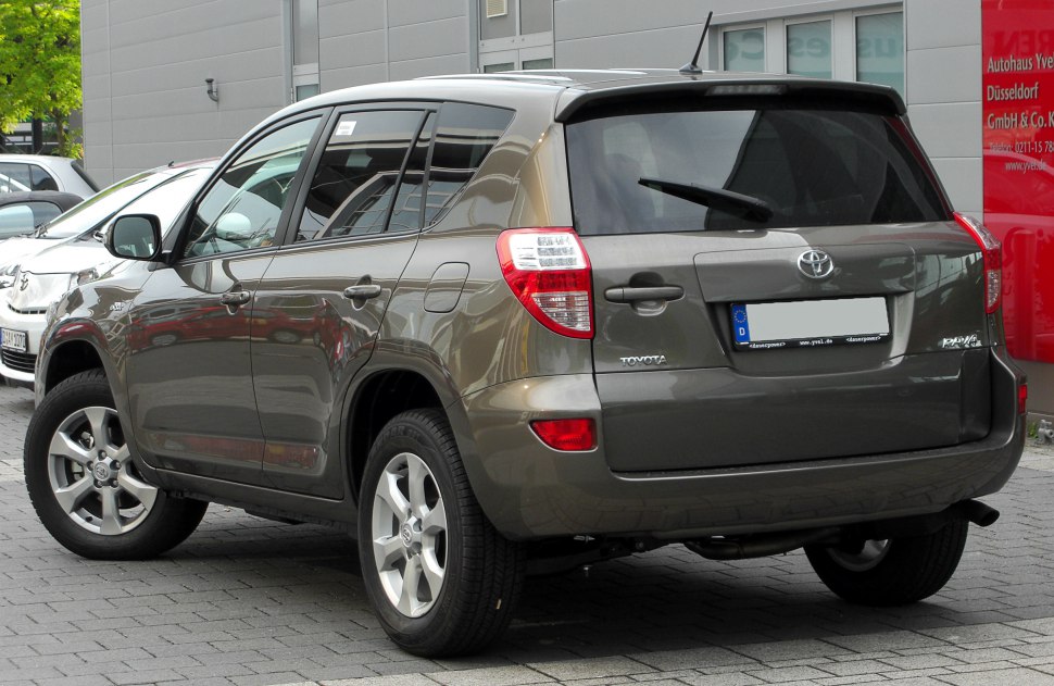 Rear view of a 2011 compact SUV with alloy wheels and rear windshield wiper