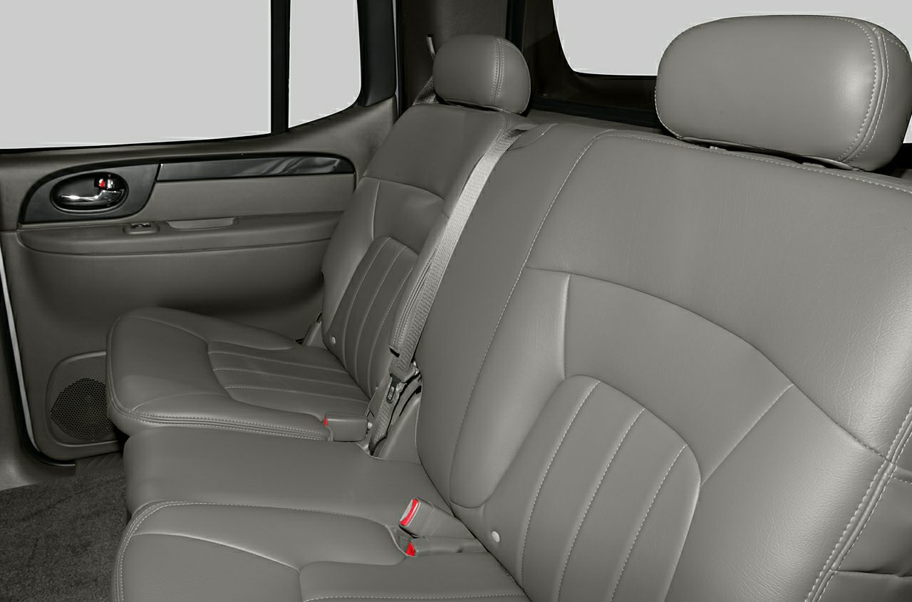 Rear leather seats with headrests and seatbelts