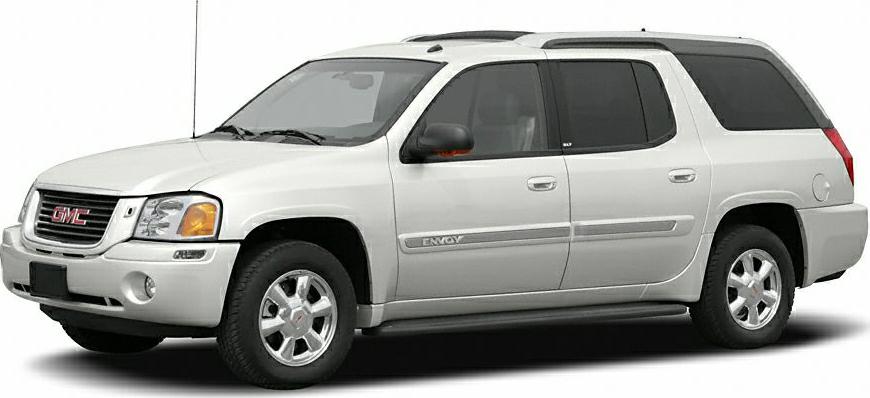 Side view of white SUV with distinctive rear compartment and extended body