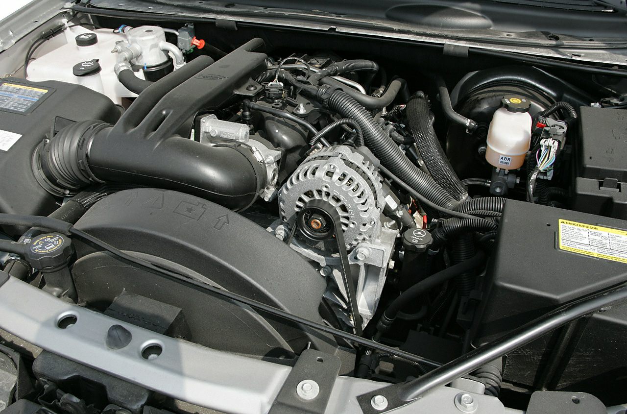 Close-up of engine bay with belt-driven components