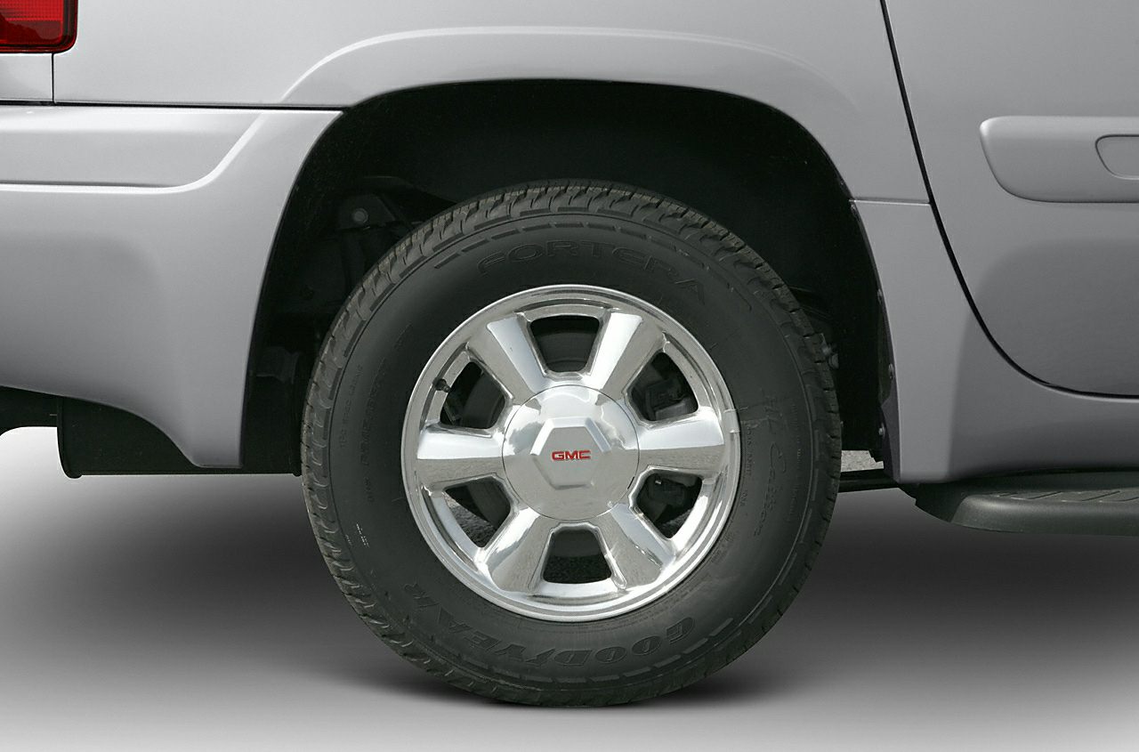 Close-up of six-spoke alloy wheel with Goodyear tire on vehicle rear side