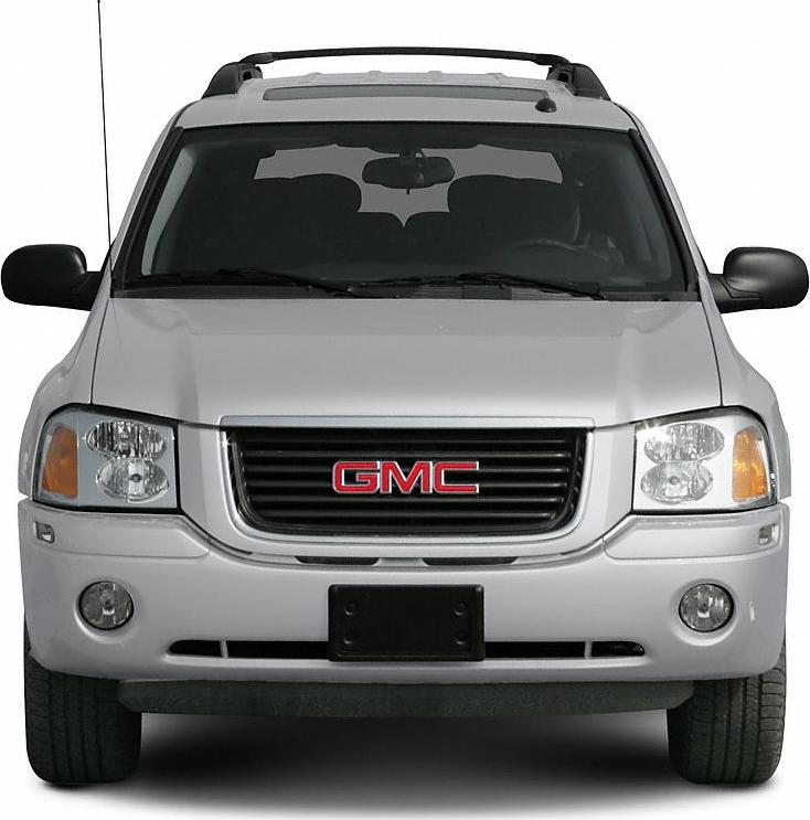 Silver SUV front with grille, headlights, and fog lamps