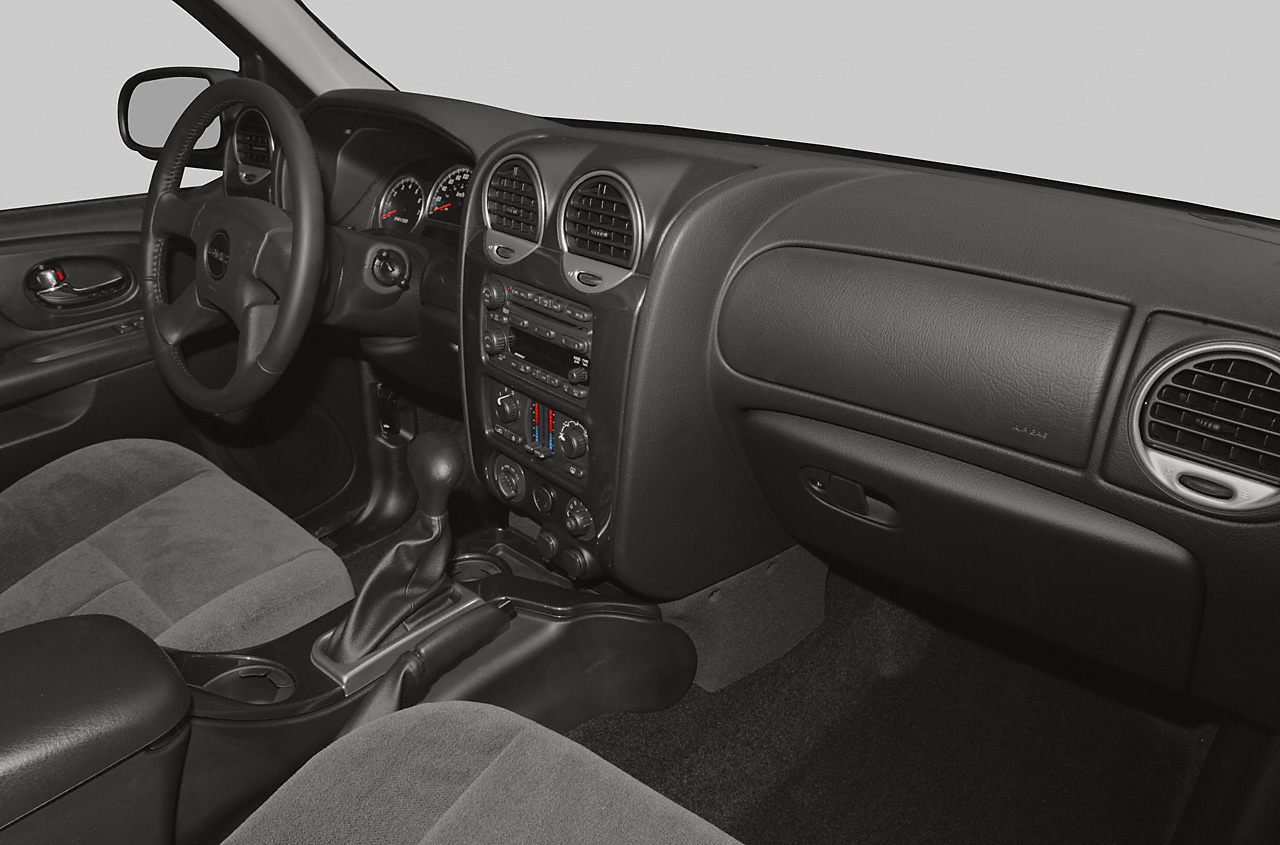 Dashboard and front seating with steering wheel and center console