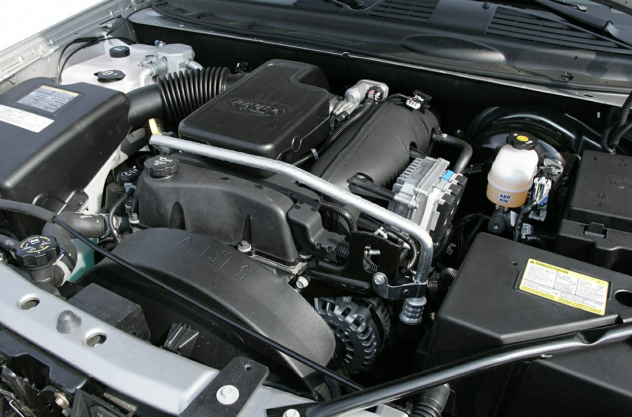 Engine compartment with intake system and components