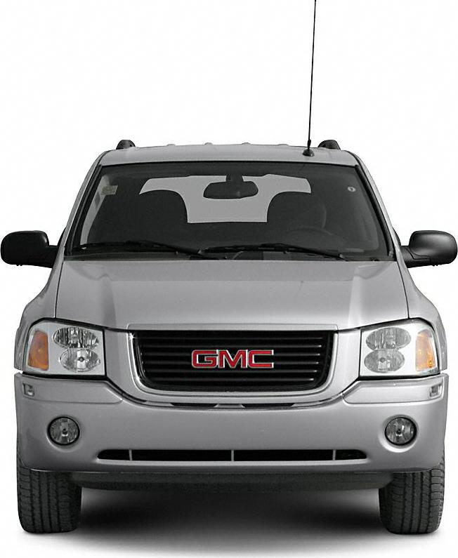 Front view showing grille, headlights, fog lights, and antenna of a large SUV