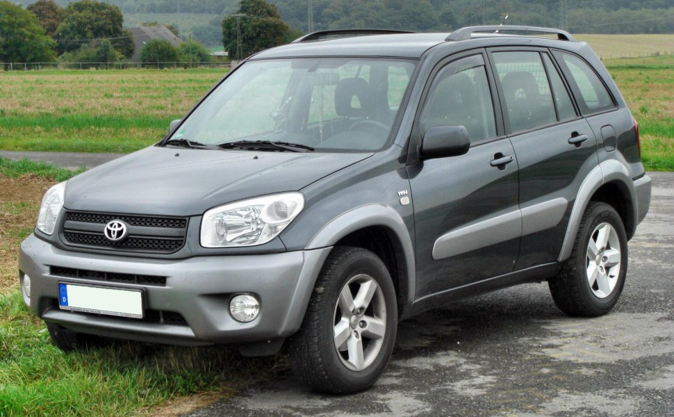 Front and side view of a 5-door SUV with distinct bumper and wheel design