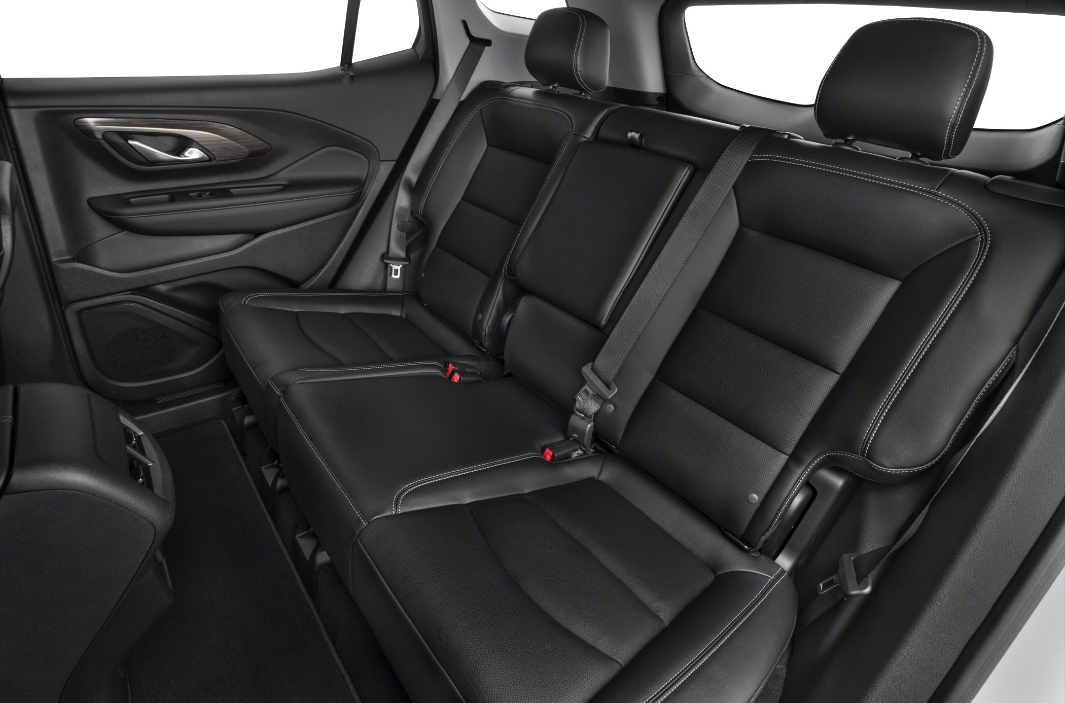 Black leather rear seating with seat belts and stitching