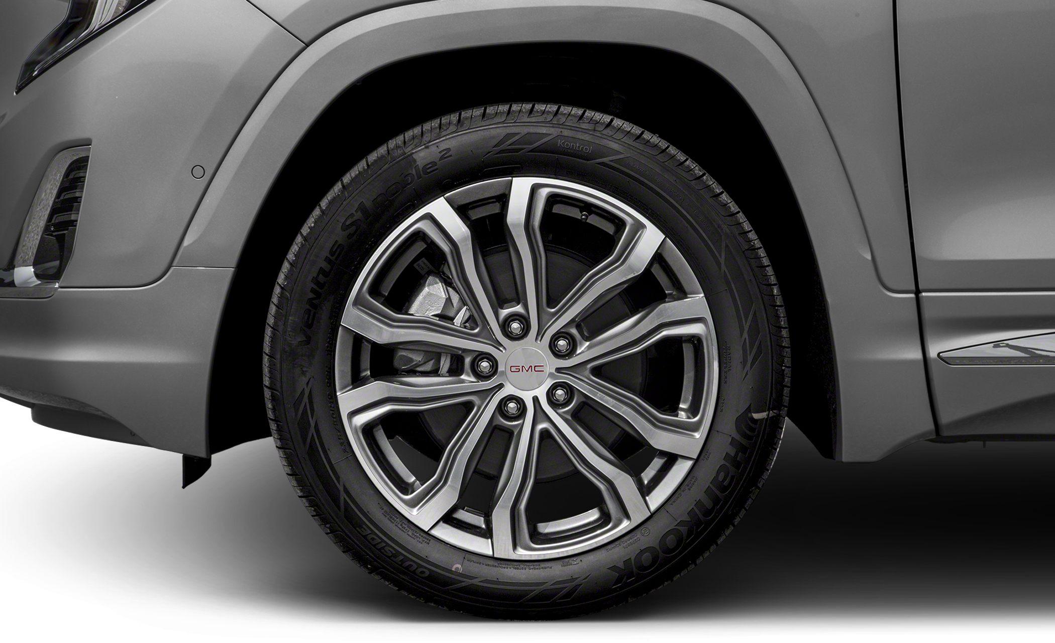 Alloy wheel and tire close-up with detailed rim design