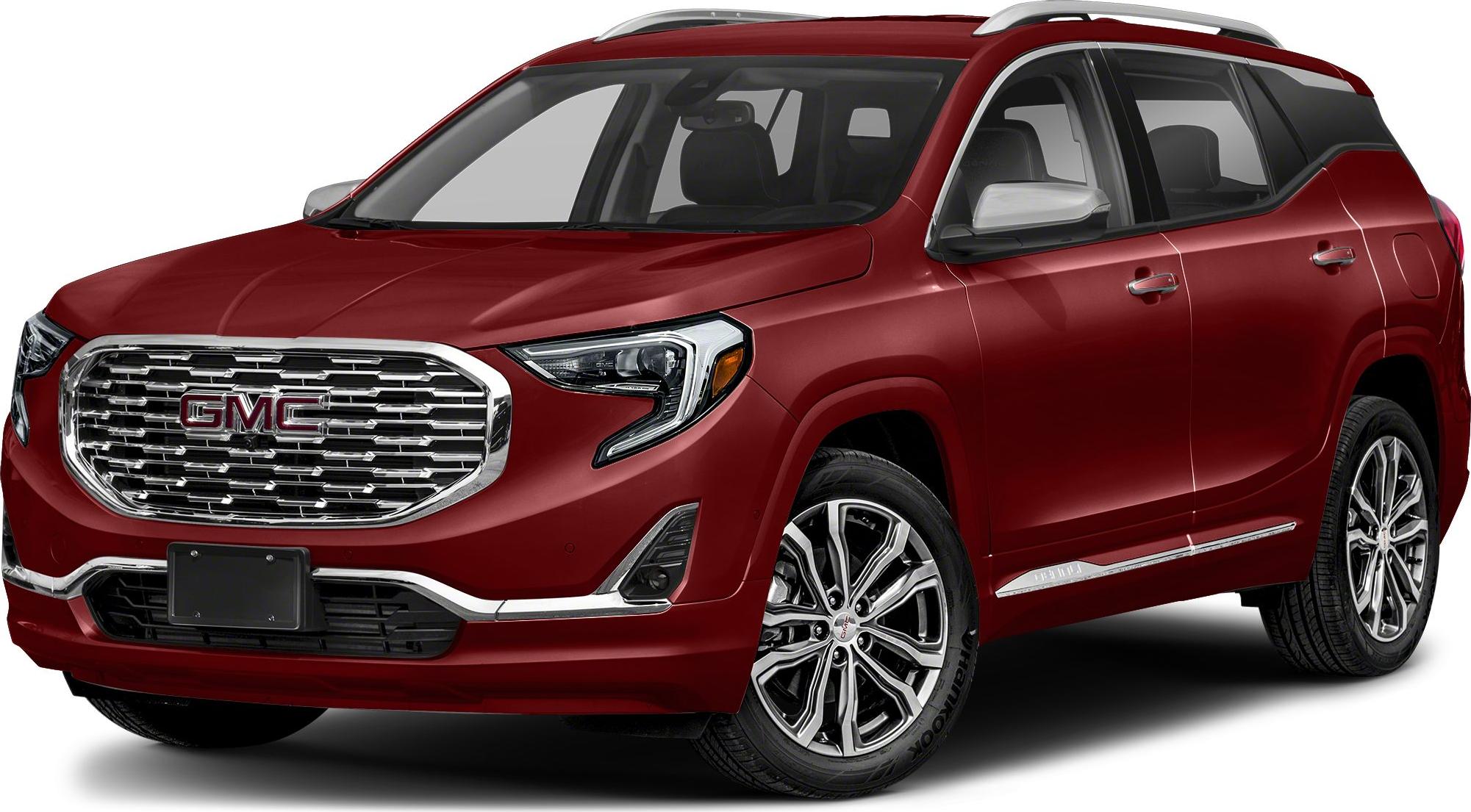 Red SUV with chrome grille and alloy wheels.