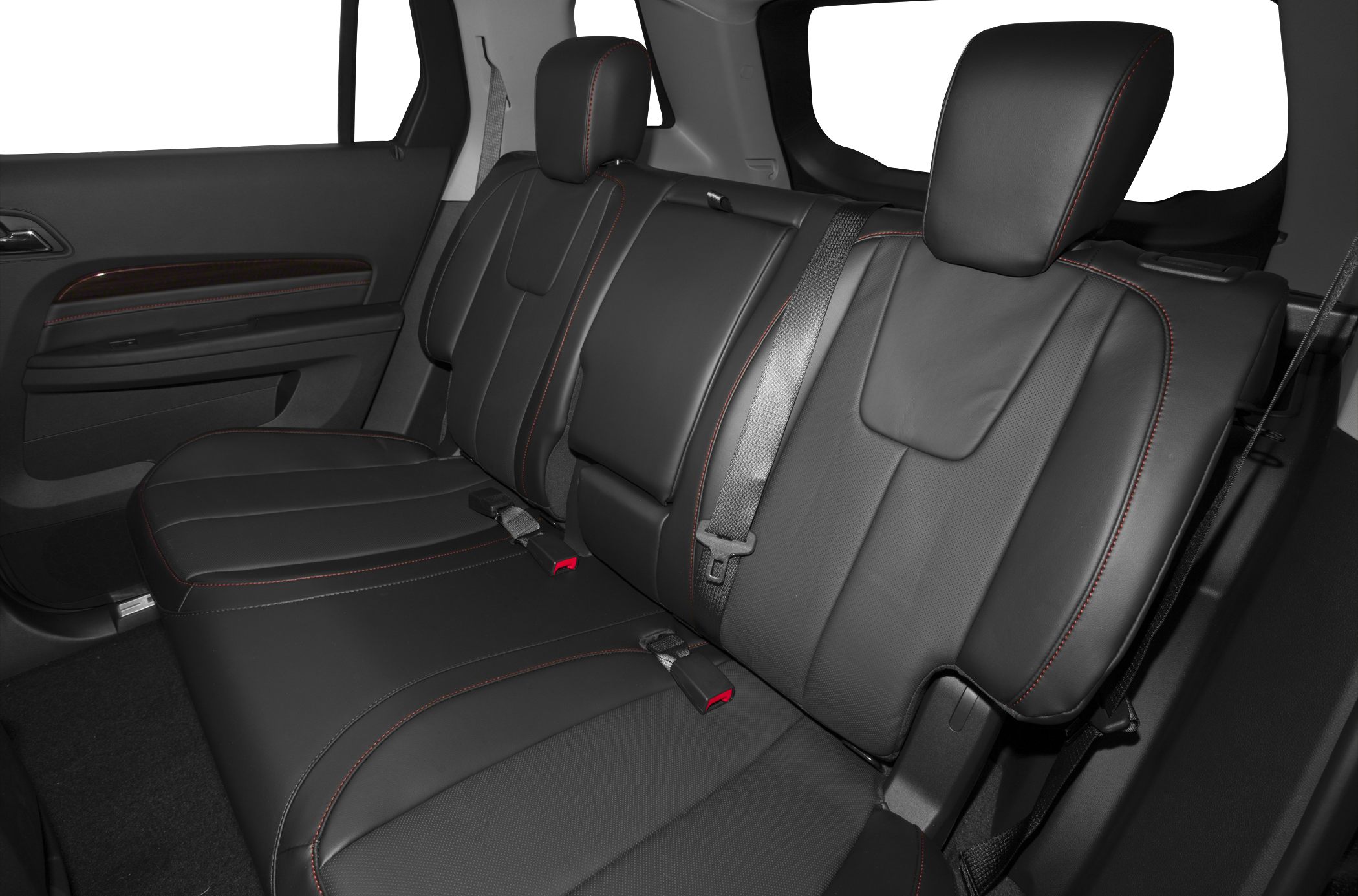 Rear seat with black leather upholstery and red stitching