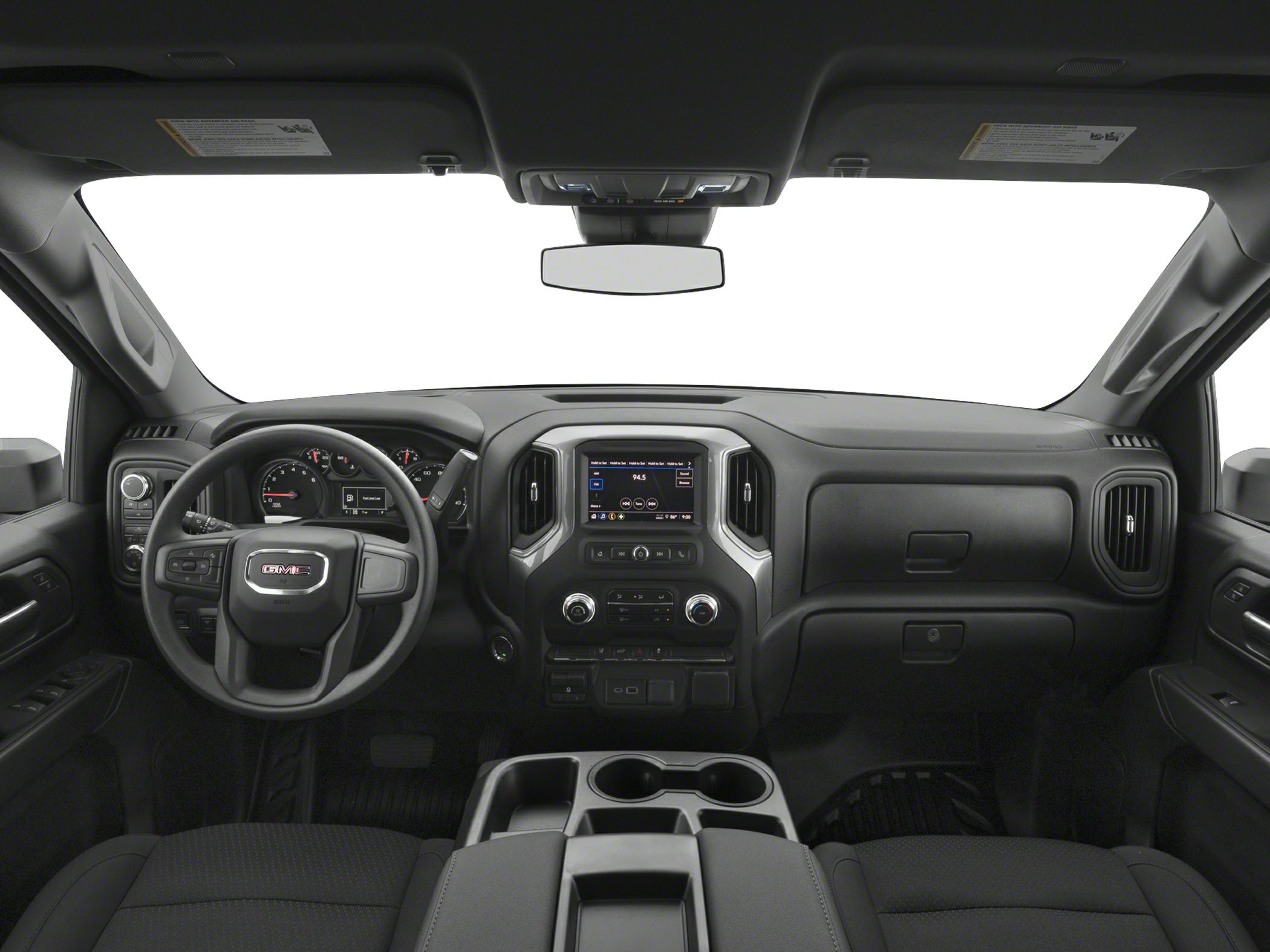 Modern dashboard with infotainment display and control knobs.