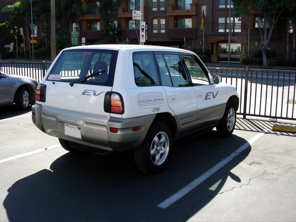 Rear view of 1997 electric SUV with EV badges and two-tone body