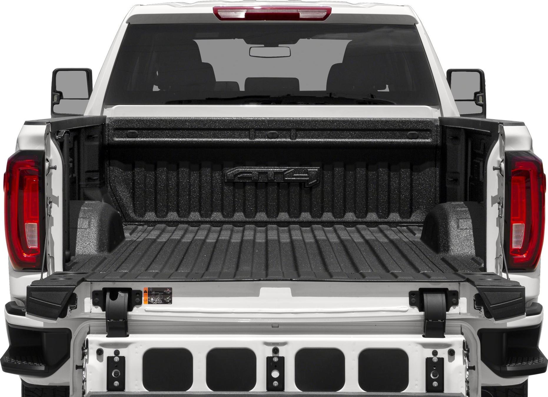 Open multi-function tailgate and spacious truck bed with bed liner.