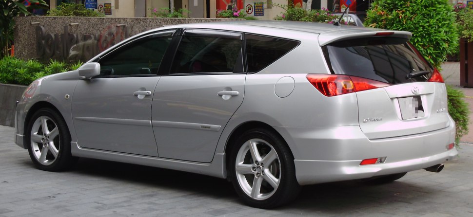 Silver wagon rear side profile with sporty alloy wheels and tinted windows