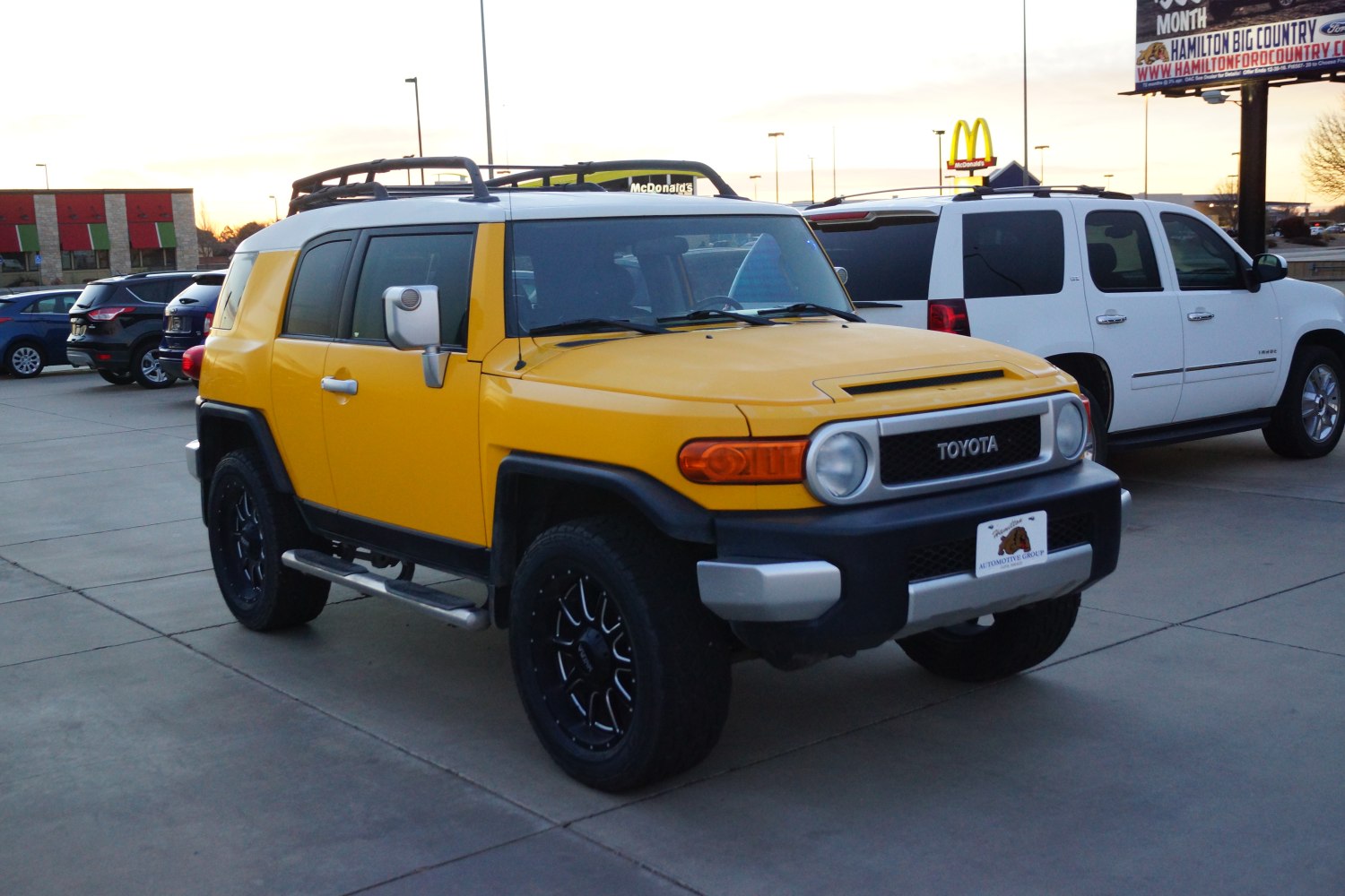 Off-road SUV with roof rack and black alloy wheels
