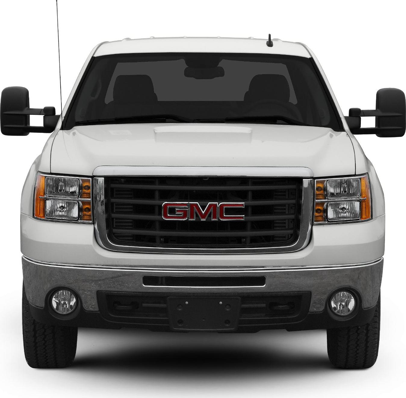 Front view with grille, dual headlights, and towing mirrors