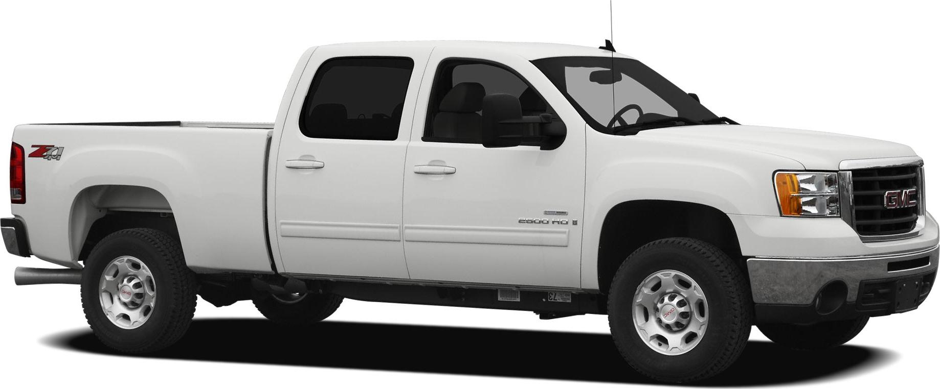 Heavy duty crew cab pickup with standard cargo bed and off-road tires.