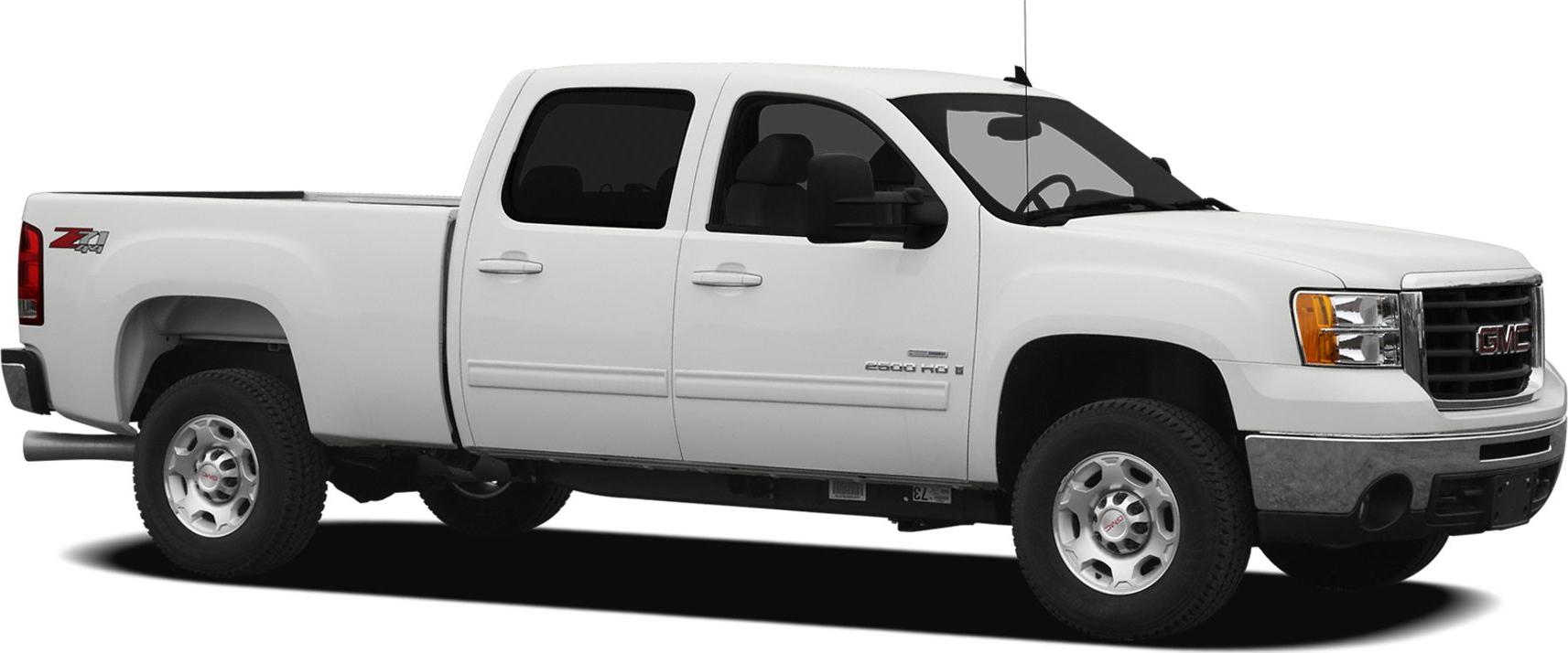 White heavy-duty pickup with crew cab and standard cargo box