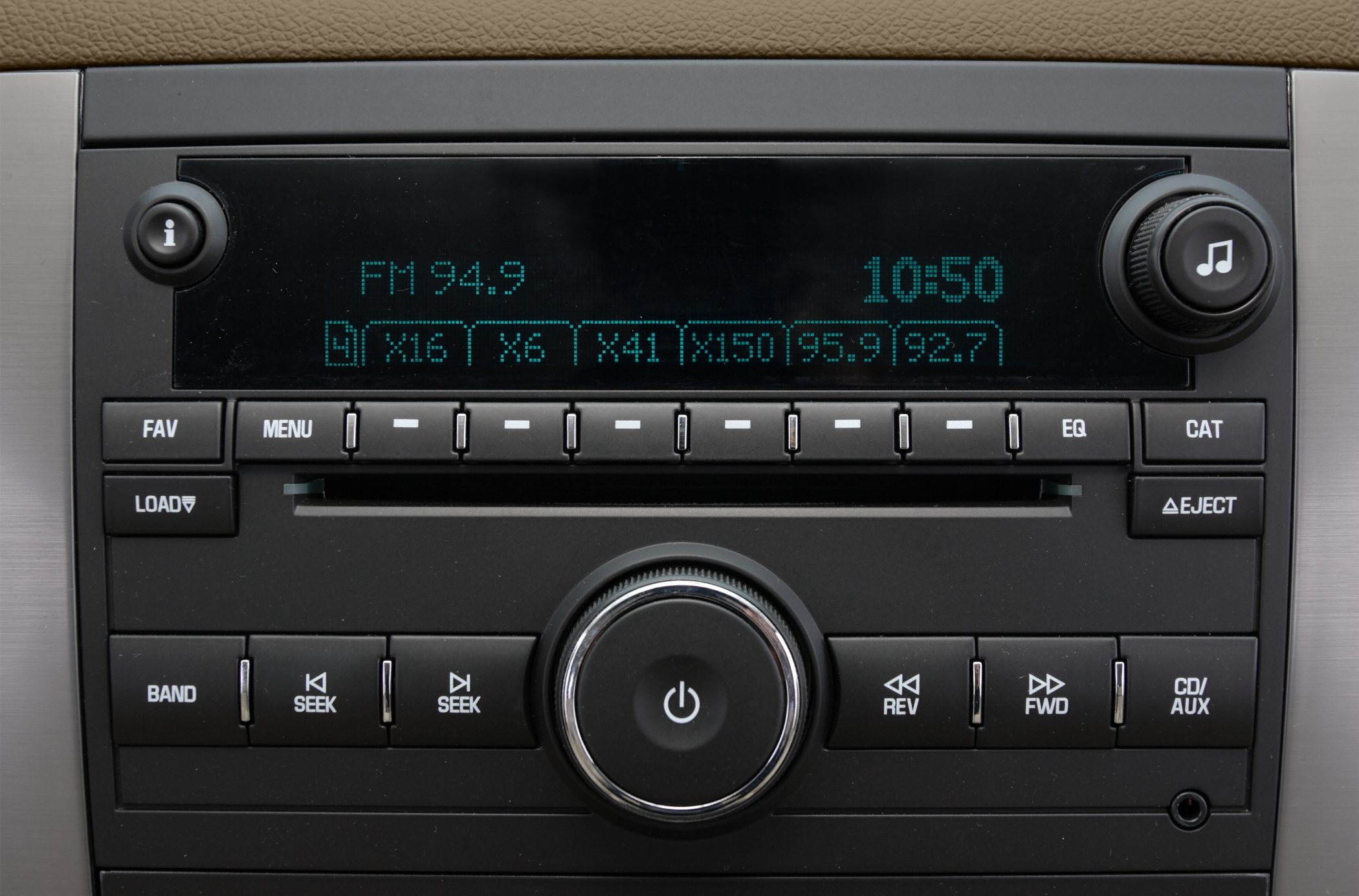 Radio and CD player head unit with digital FM display and control buttons