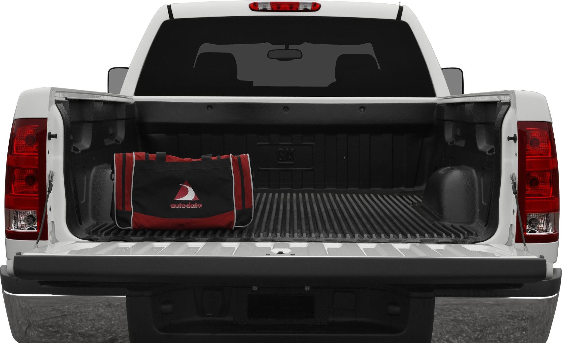 Open pickup bed with tailgate down and bag inside