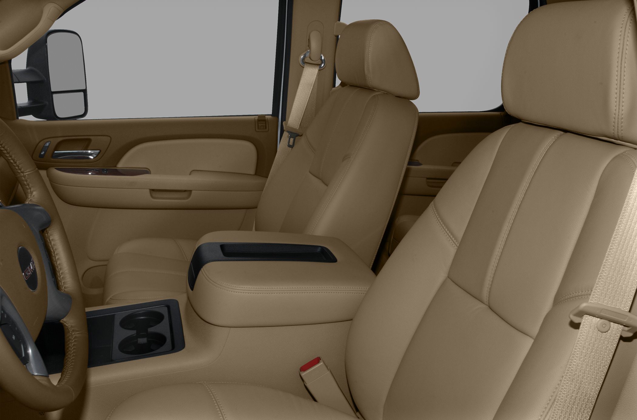Beige leather front seats and center console with cup holders