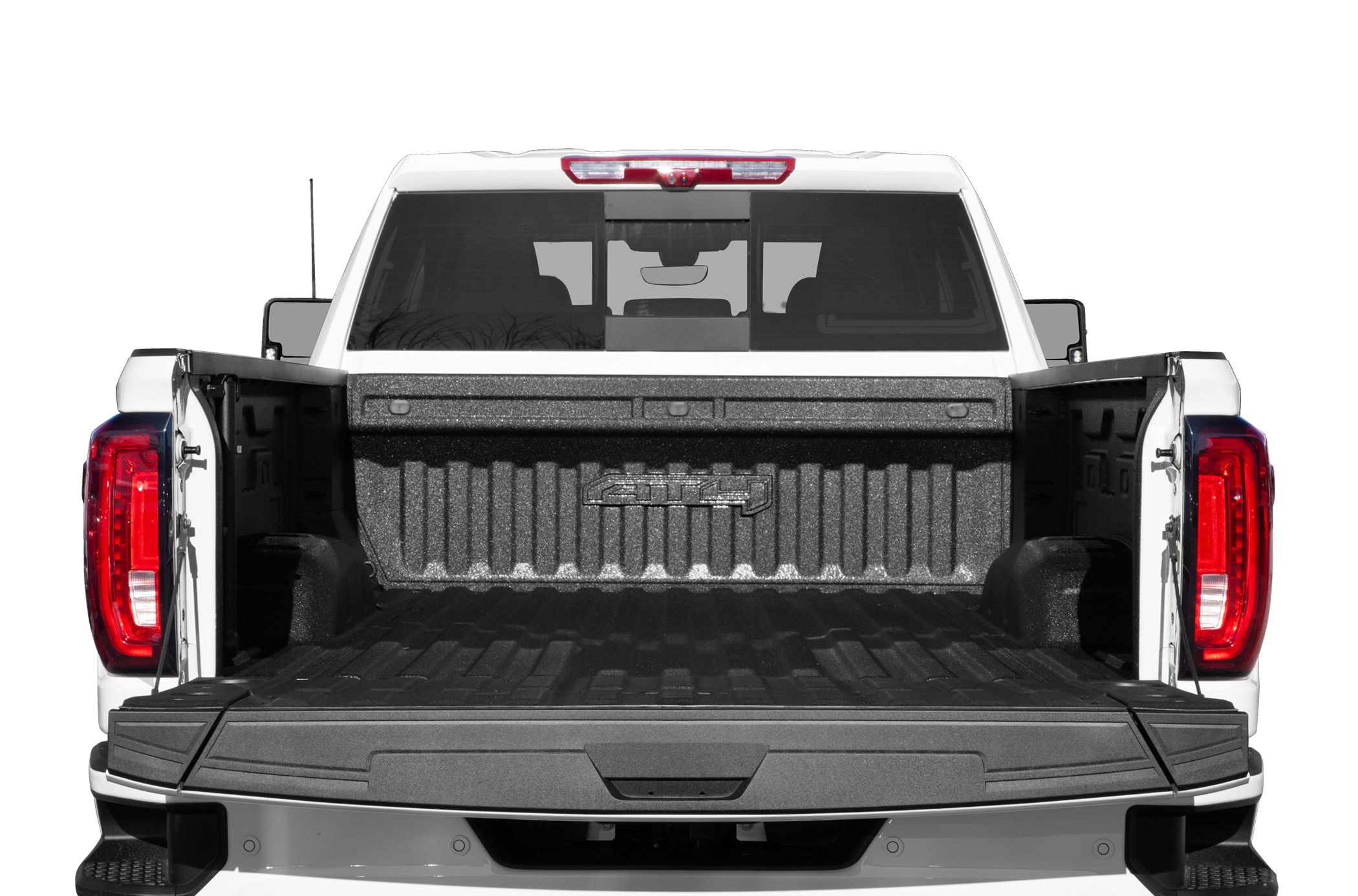 Heavy-duty pickup truck with open tailgate and textured bed liner