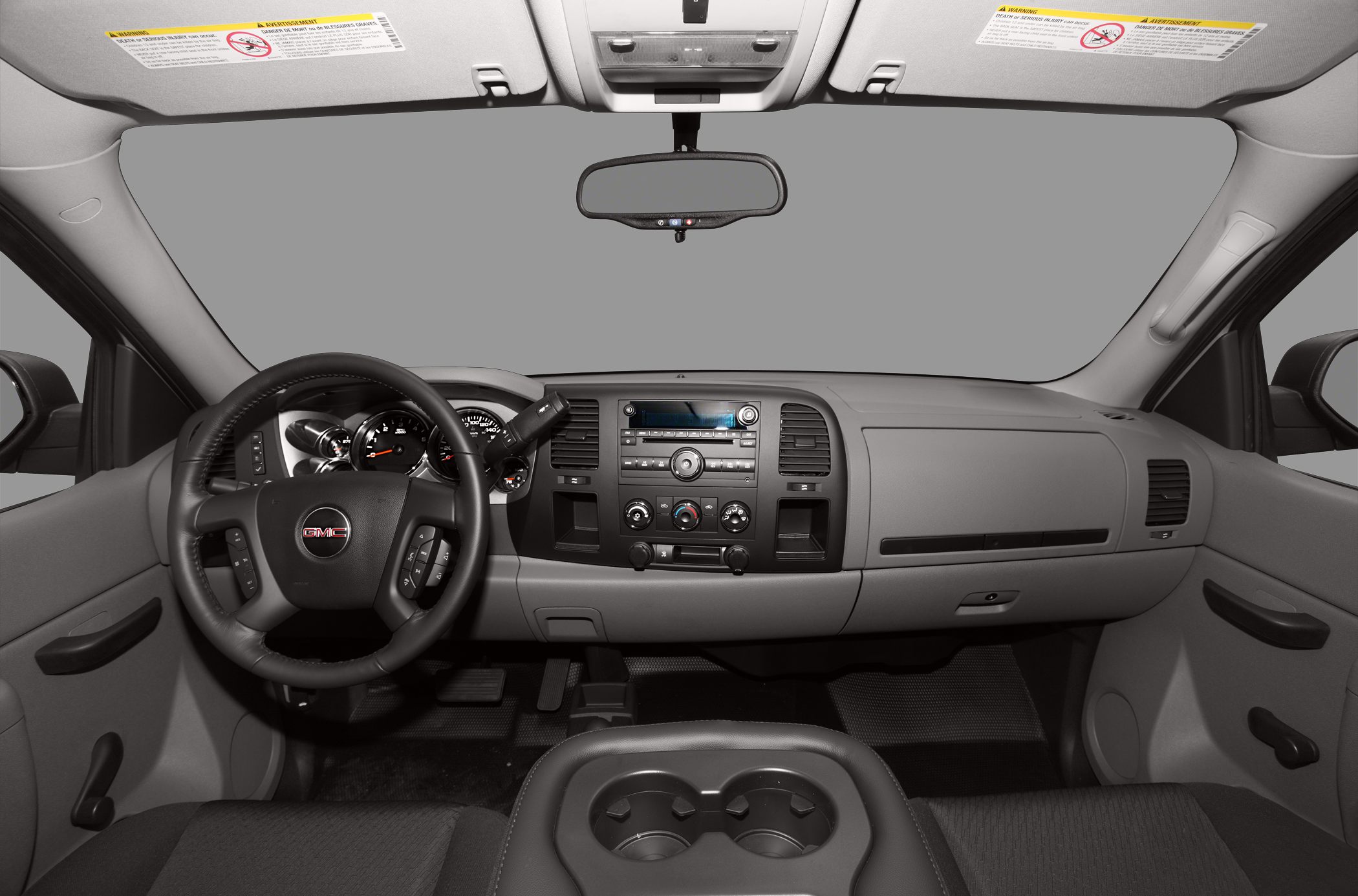 Dashboard, steering wheel, center console cup holders