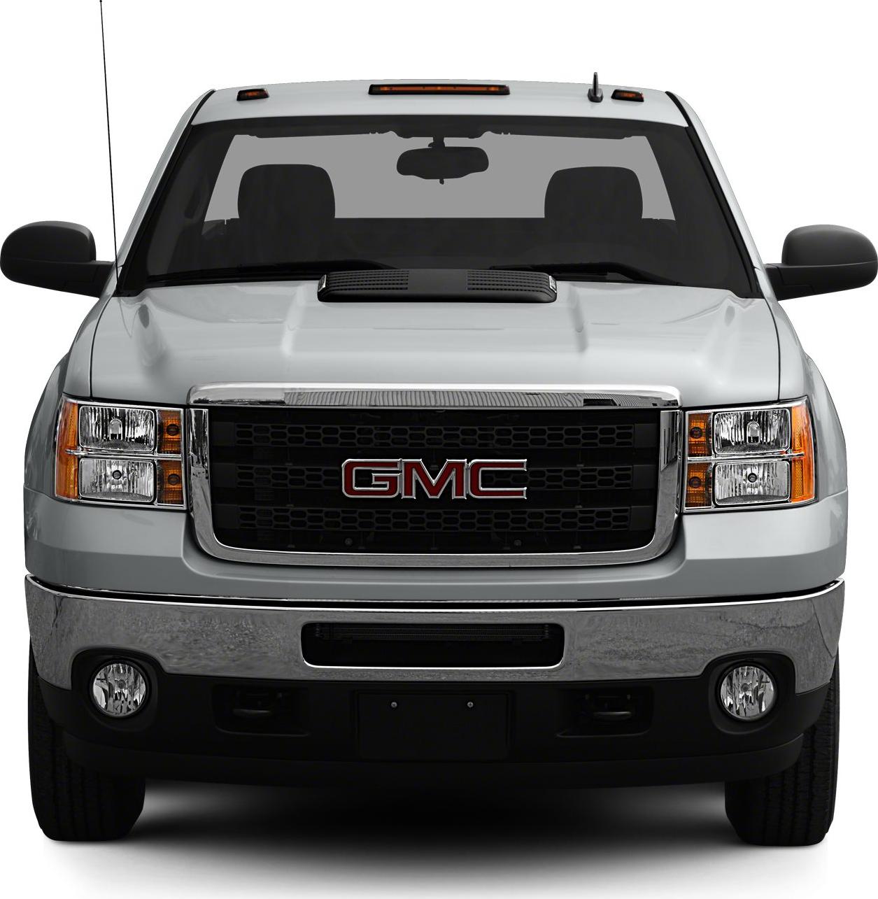 Front view of heavy duty pickup truck with grille and headlights