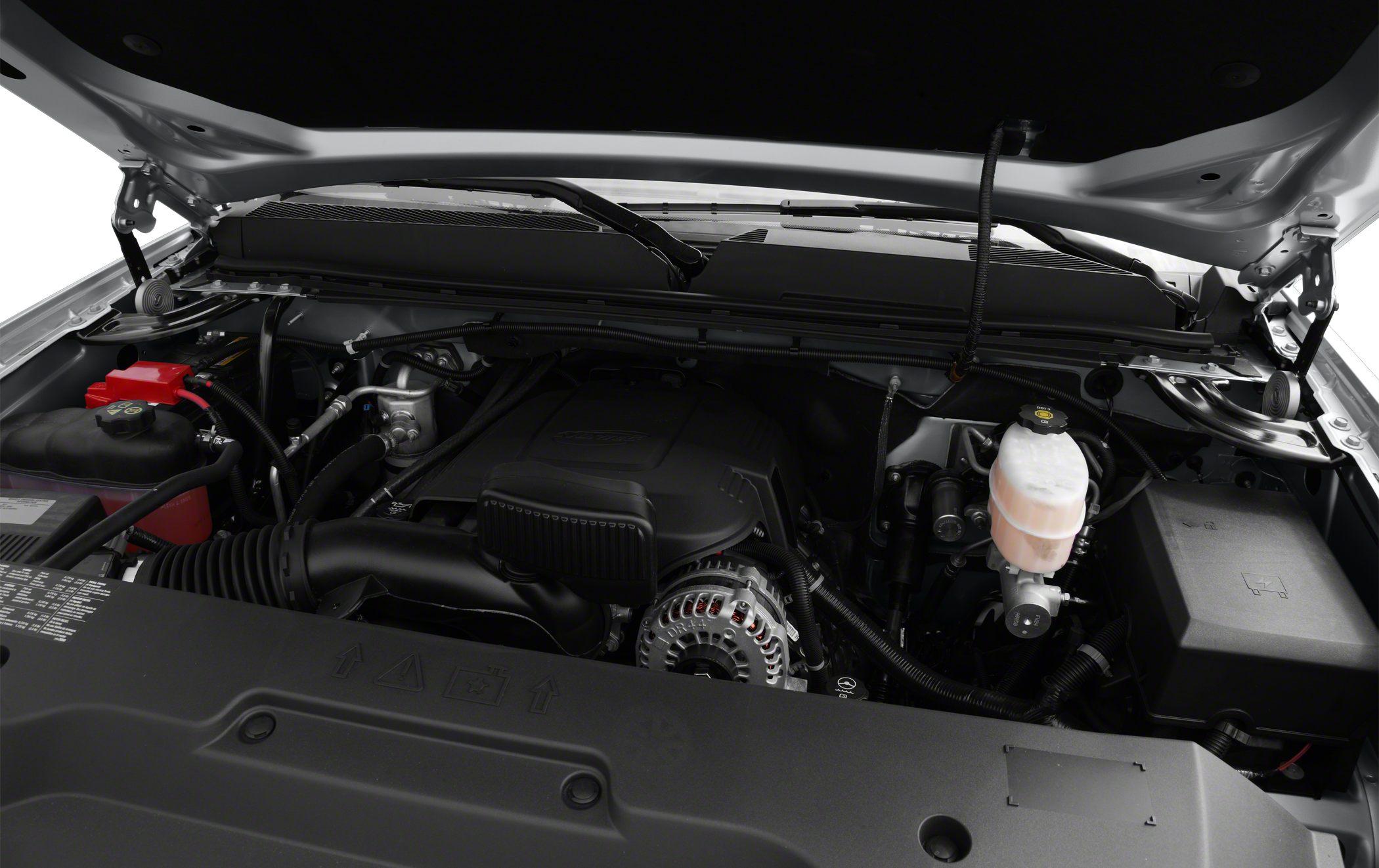 Engine bay with hood open showing truck engine components