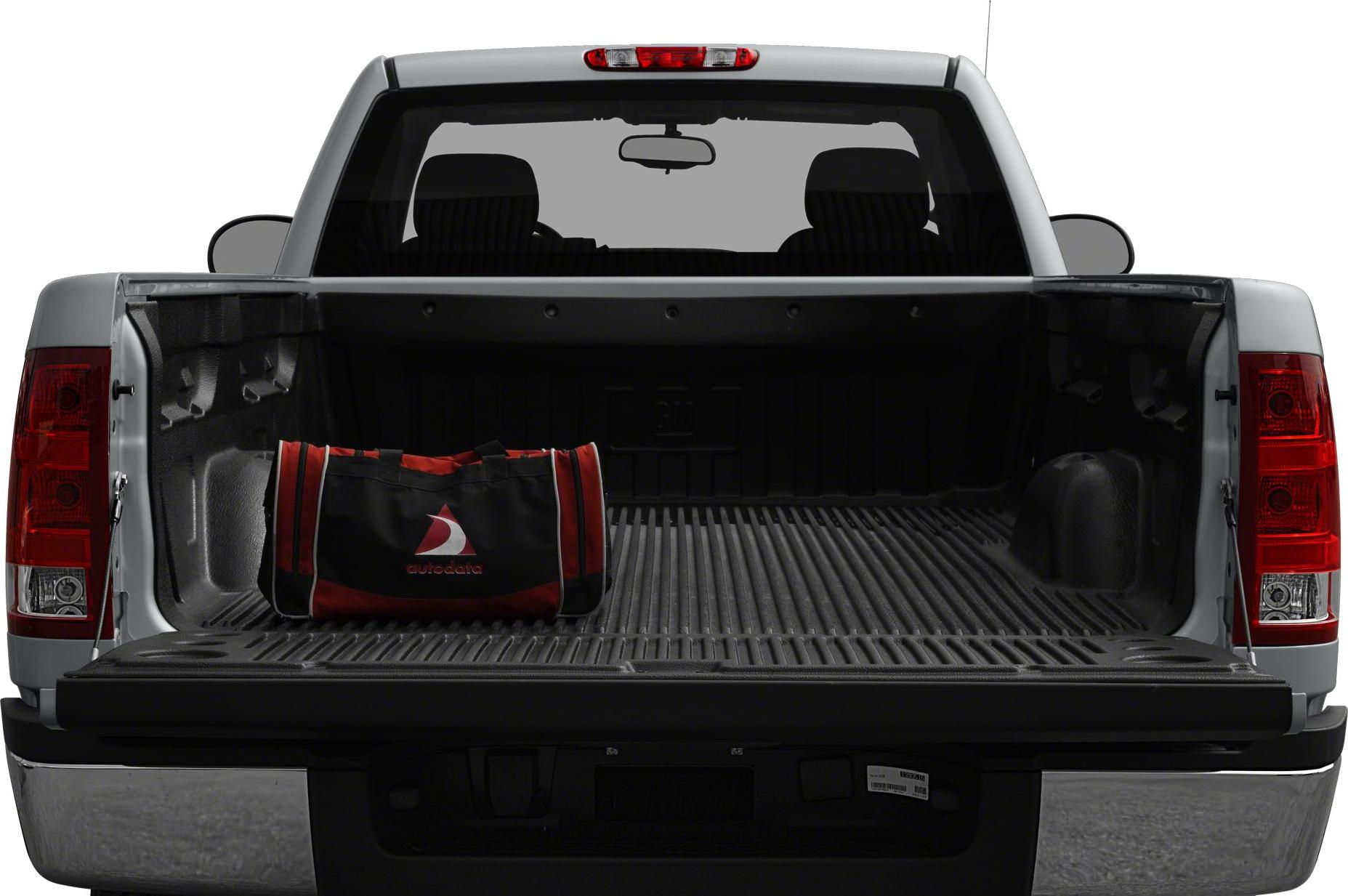 Open long box pickup truck bed with cargo bag.