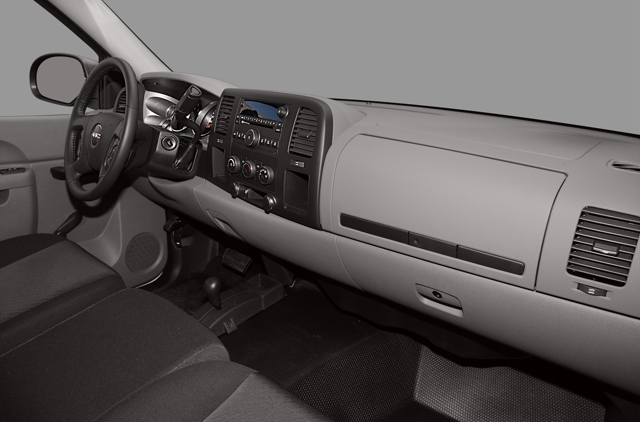 Dashboard and cabin interior with steering wheel and control panel