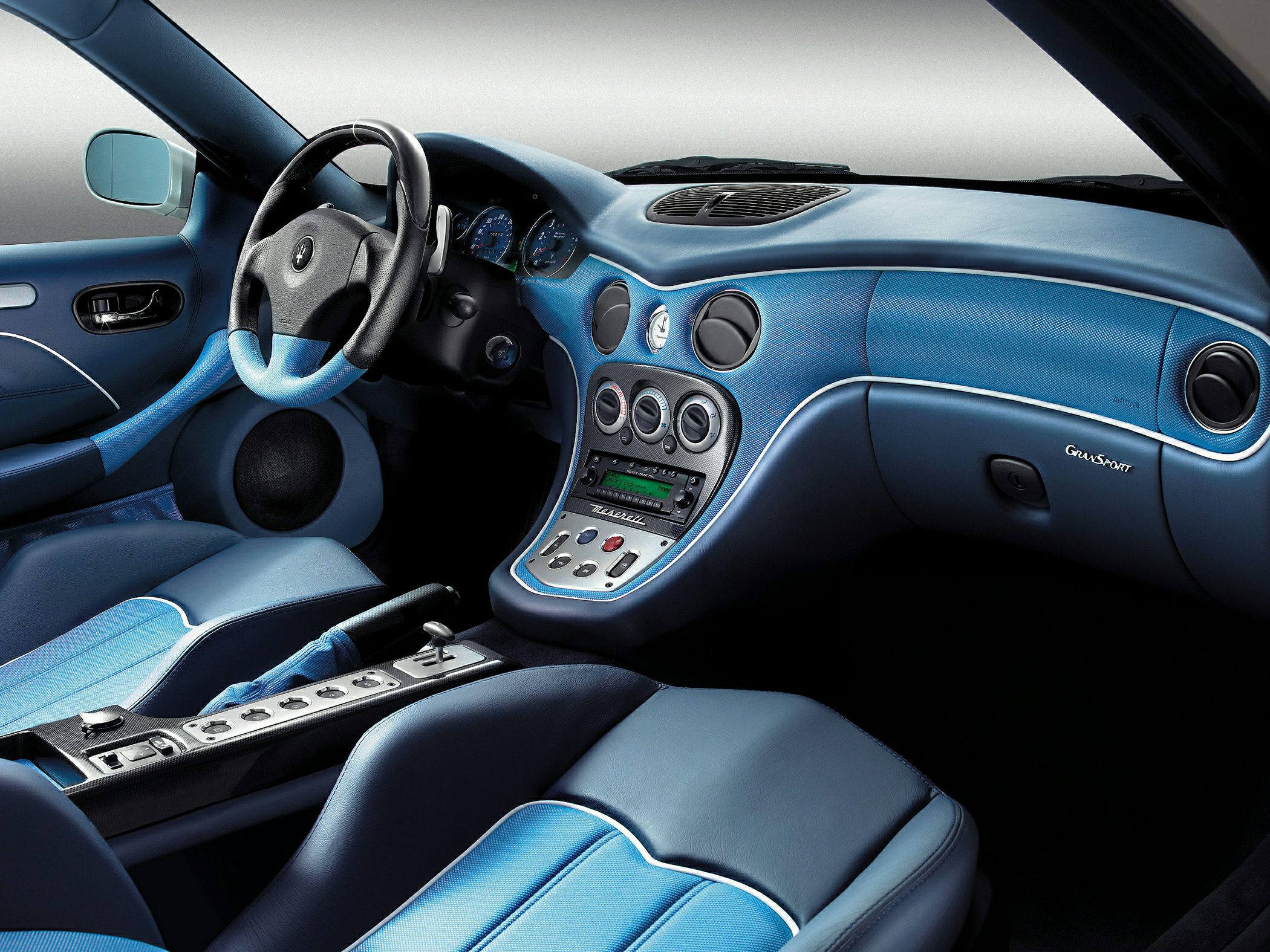 Blue leather interior with advanced dashboard and control panel