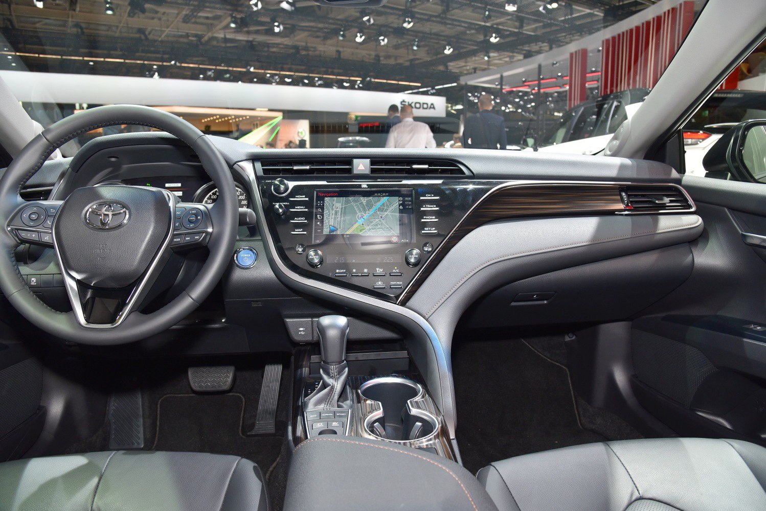 Modern dashboard and multifunction steering wheel with infotainment system.