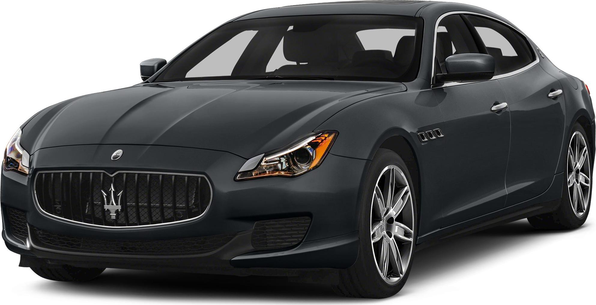 Luxury sedan front view with distinctive grille and headlights.