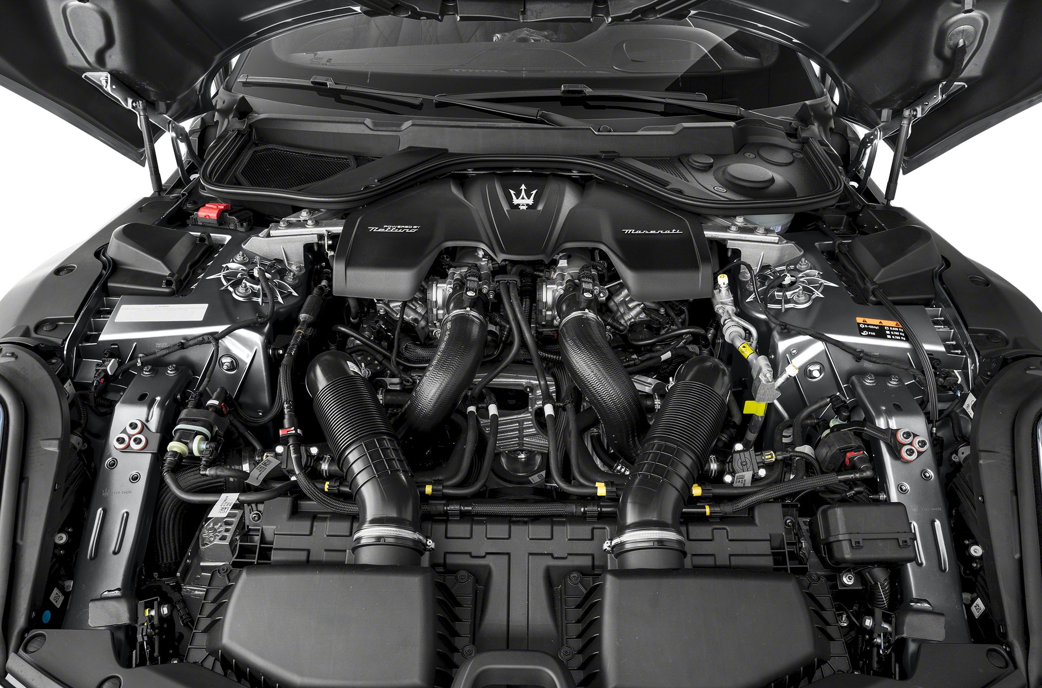 High-performance engine compartment with twin air intakes and Maserati branding